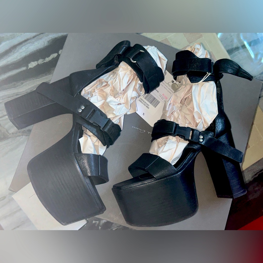 Rick Owen’s spike bow kiss sandal platform